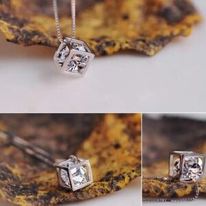 Hollow Cube Shape Pendant Necklace with Inlaid Zircon. New